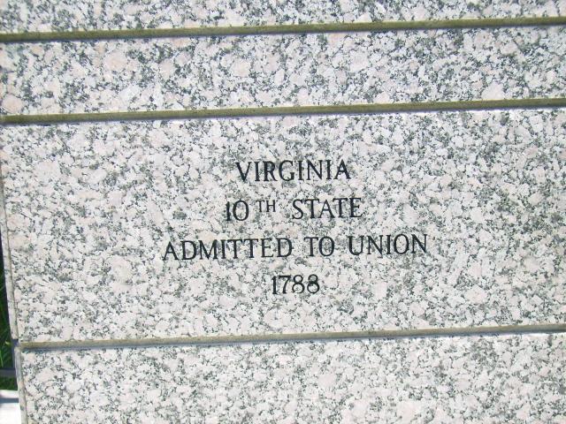 Virginia etched on marble columns at monument entrance
